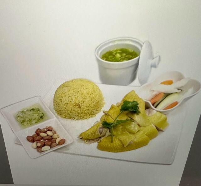 House Signature Hainanese Chicken Over Rice